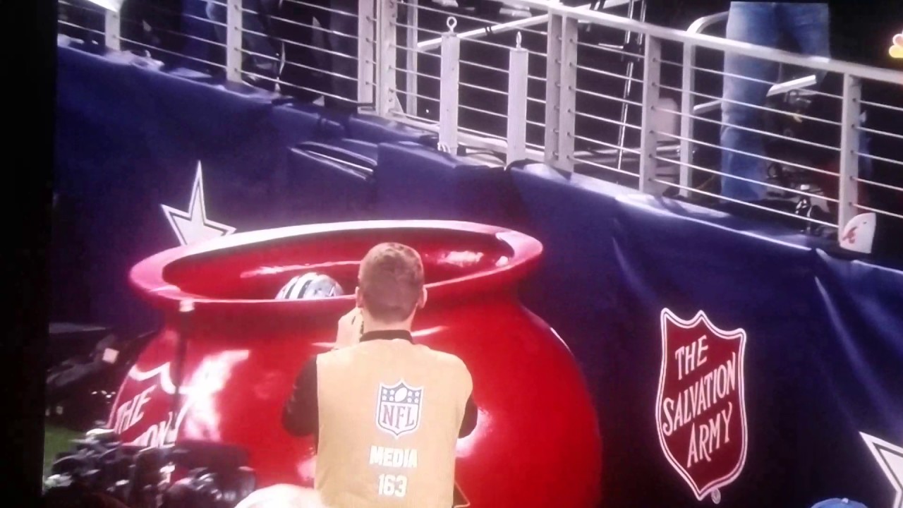 Ezekiel Elliott Jumping In The Pot The Salvation Army Dallas Cowboys Ezekiel elliott jumping in the pot the salvation army dallas cowboys