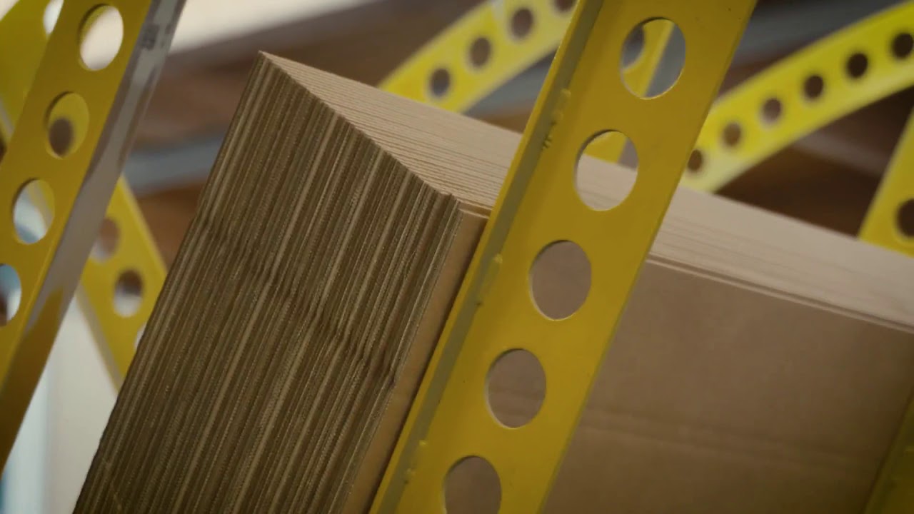 Intralogistics - Banding system for corrugated cardboard stacks with edge protection by Neetwk