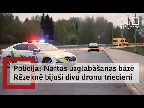 Police cordon on a road in Rēzekne in a Latvian Television update on two drone impacts at the oil-storage base.