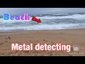 At the beach metal detecting