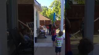 Kid swings bat at pinata and accidentally hits little boy on the head