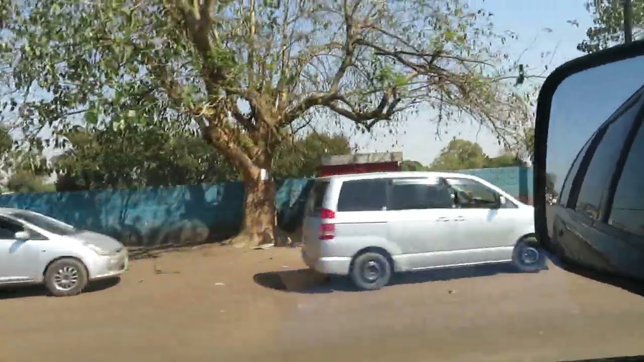 Driving passing through Monze Town in the southern province of Zambia.