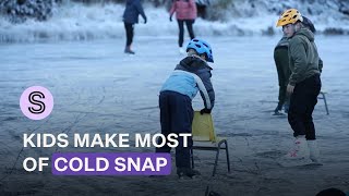 Children whip out their skates as cold snap freezes over Nelson lake | Stuff.co.nz