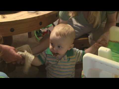 Toren eating a chocolate cupcake