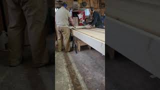 Router Planing the Little Red Cup Coffee Shop's Douglas Fir bartop.