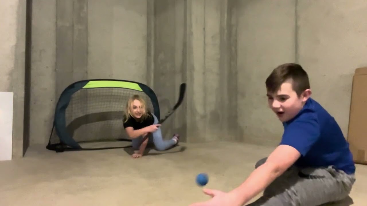 Knee hockey game (new person)