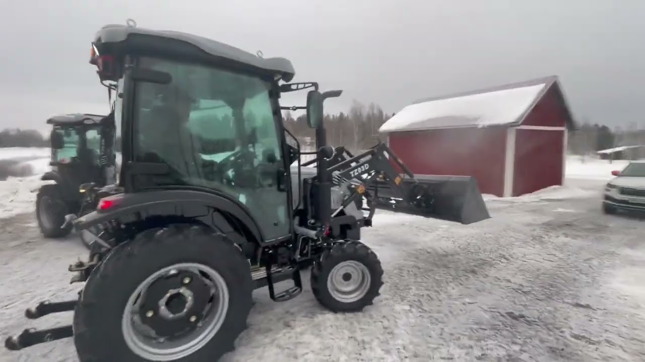 Traktor med lastare och skopa Landtrac 254 Cabin 4WD