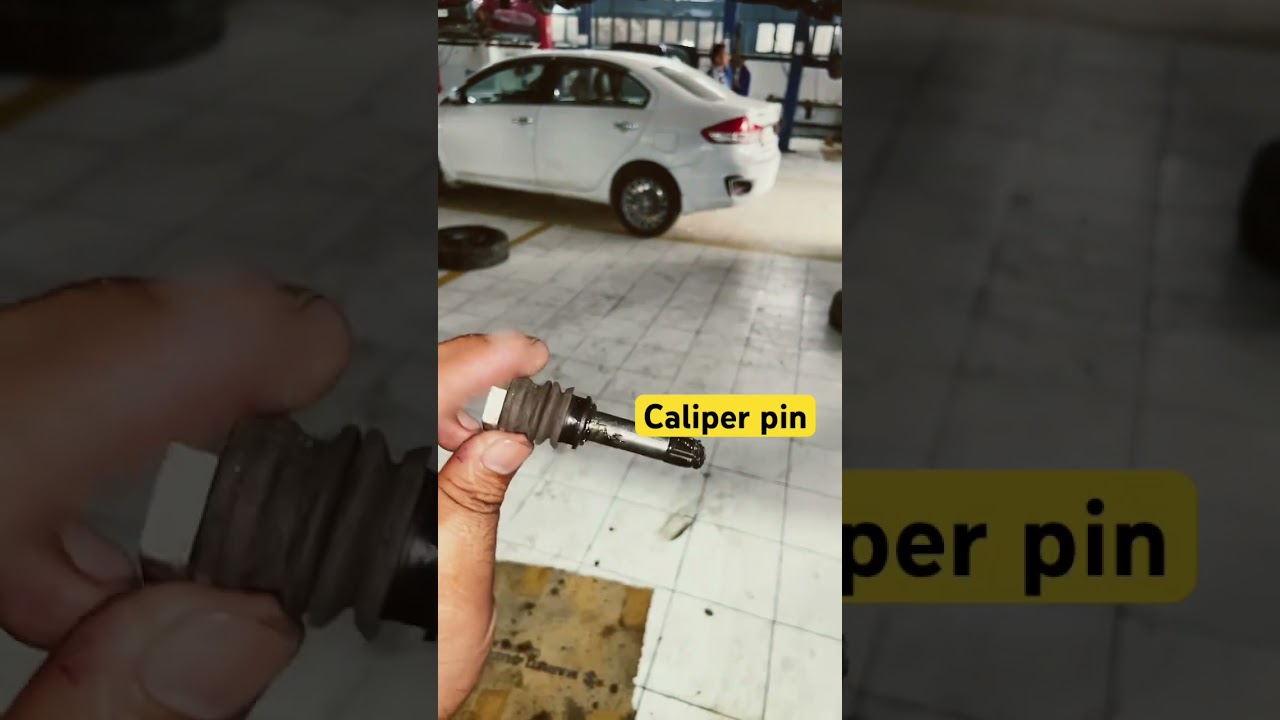 Caliper pin and brake pad check 