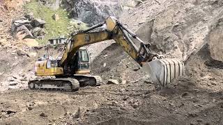 Cat hitachi machine filling of geo grid bed with ease!!!!