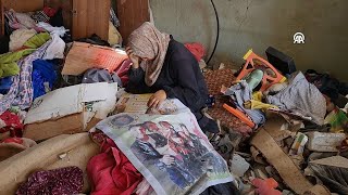 Palestinian families search for their belongings in the rubble of their homes