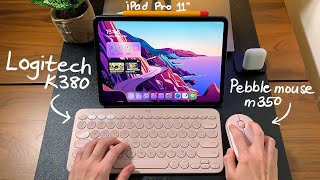 Pink Logitech K380 & M350 Pebble mouse on iPad Pro 11”