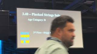 Announcing Isaac got 1st for plucked strings