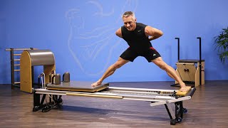 Squat to Side Split on Pilates Reformer