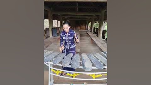 Đàn đá _ Cô gái vót chông