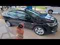 detalhes reais do novo Chevrolet onix plus premier 1 116 cv turbo automático preto ouro negro