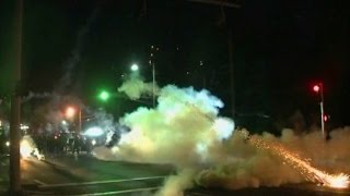 Police and protesters clash for fourth night in St. Louis suburb