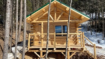 First line of chinking is down! Interior window trim #logcabinbuild #logcabin #chinking