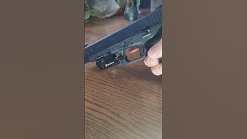 Trigger reset magazine dry firing training aid tool.