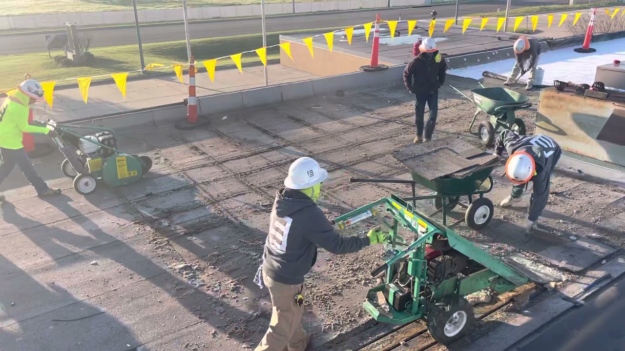 Two minutes of commercial flat roof tear off! Exciting stuff! YouTube