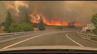 A forest fire is approaching the highway in Valdizarbe, Navarra province. Spain