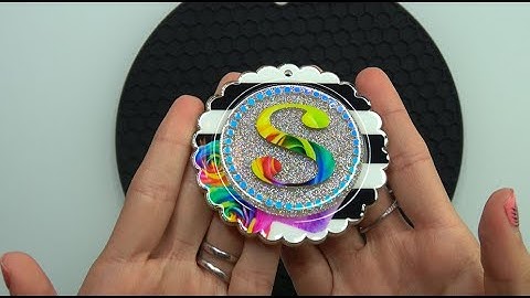 How to make a layered acrylic keychain with loose glitter and printed vinyl.