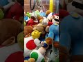 intensely overfilling my claw machine#arcade #claw machine #Super Mario