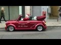 Santa claus driving supercars of london
