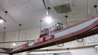 A TRAIN RUNNING AROUND THE UPPER PART OF THE SEPTA STORE IN PHILADELPHIA