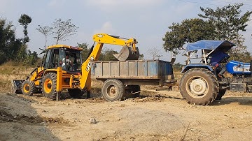 JCB Backhoe Machine Loading Stone in Tractor - JCB Machine at Work