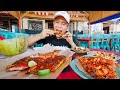 Famous seafood in bali  grilled fish  shrimp at jimbaran beach  bali indonesia