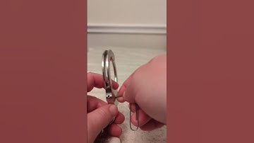 Lock picking Handcuffs with a paperclip. Standard key Peerless M300 handcuffs