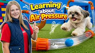 assistant teaches air pressure her dogs wiggles waggles