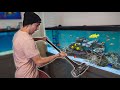 GUY SMASHES REAL FISH AQUARIUM WITH SLEDGEHAMMER!