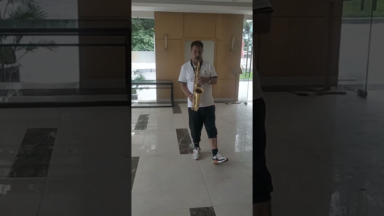 Amul Karki Dai is getting ready to play his saxophone in Chitwan! 🎷🎶... 