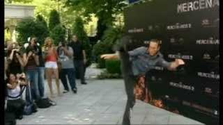 Van Damme kicking for the press with Lundgren and Statham [EX2 promo]