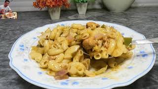 Discover the Mouthwatering Magic of Burki Kitchenette Chicken Macaroni