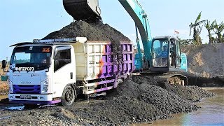 Loading Driving Overloded Dump Truck by Kobelco SK200 Excavator Isuzu Elf NMR 71HD