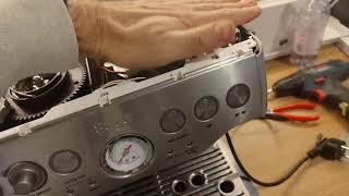 How to remove the front panel from a Sage Barista Express machine?