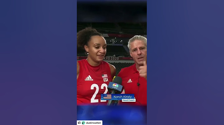 Coach emotional moment after winning olympic medal