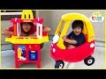 Ryans drive thru pretend play on kids power wheels ride on car with emma and kate