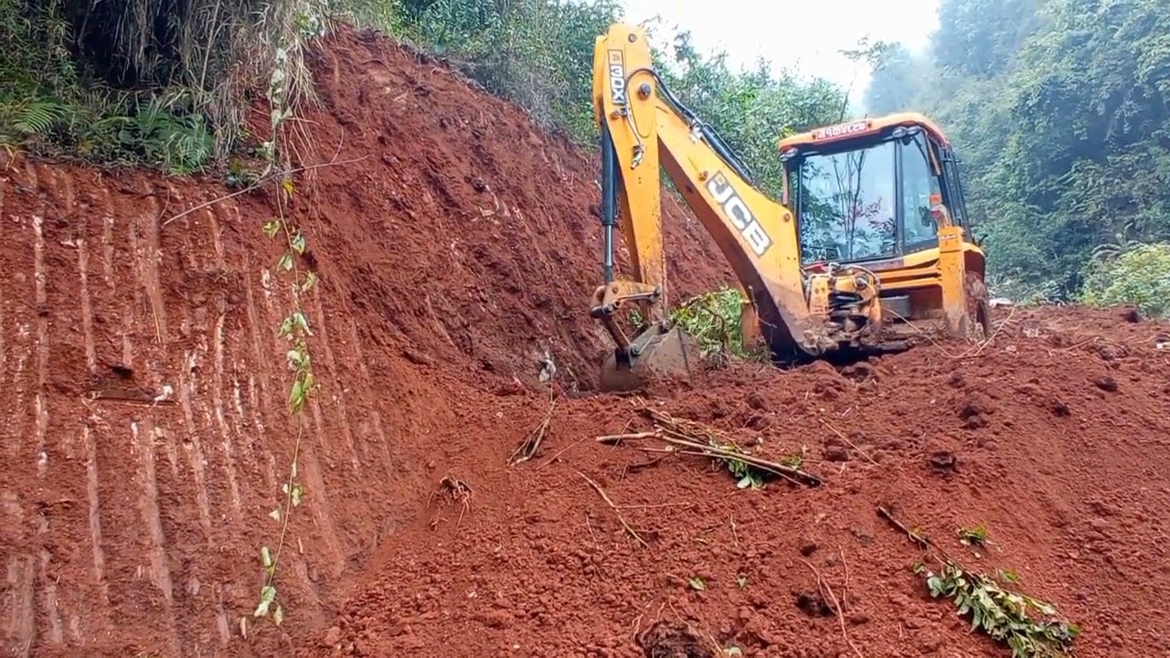 making road in jungle for water supply purpose JCB super 3 dx backhoe loader