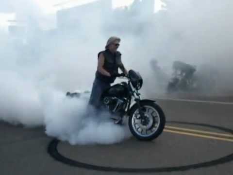 Master of Ceremonies doing a burnout on the Annual Cumberland Wisconsin Hog Jam Poker run and Rodeo.