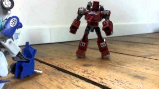 Transformers Stopmotion-Mirage vs Warpath-