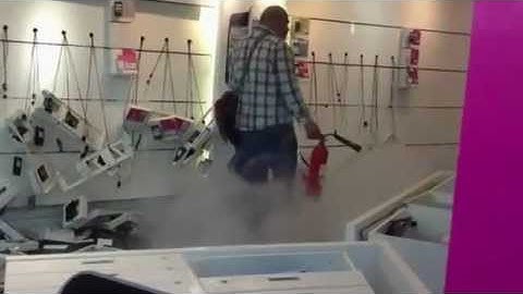 Man destroys T-Mobile Store For A High Cell Phone Bill