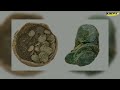 Archaeologists dig up 2000 medieval coins stashed in oak box leather envelope at french real estat