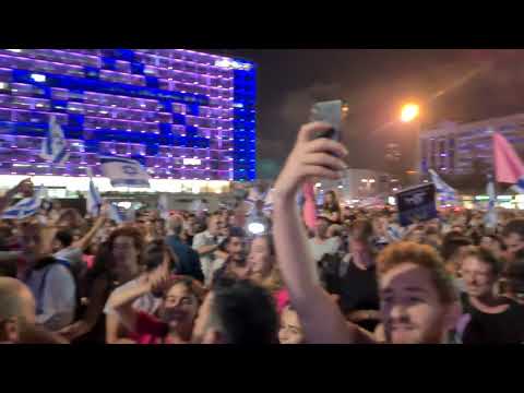 Israeli protesters gather at Tel Aviv to celebrate new government.