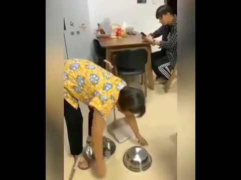 son-jokes-with-mom-while-she-picks-up-bowl