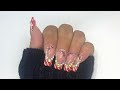 From boring to blingtastic Cute red French tip Christmas nail art 