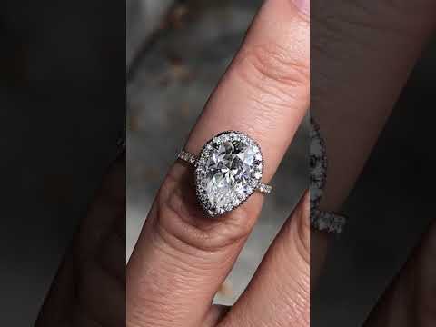 Pear Moissanite Top & Side Halo Eng Ring ring video