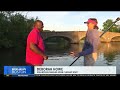 Volunteers use "cleanup boat" to get trash out of Boston's Charles River